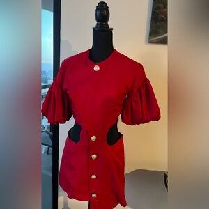 Blazer with asymmetrical cut and openings at the waist. Small size. Red.